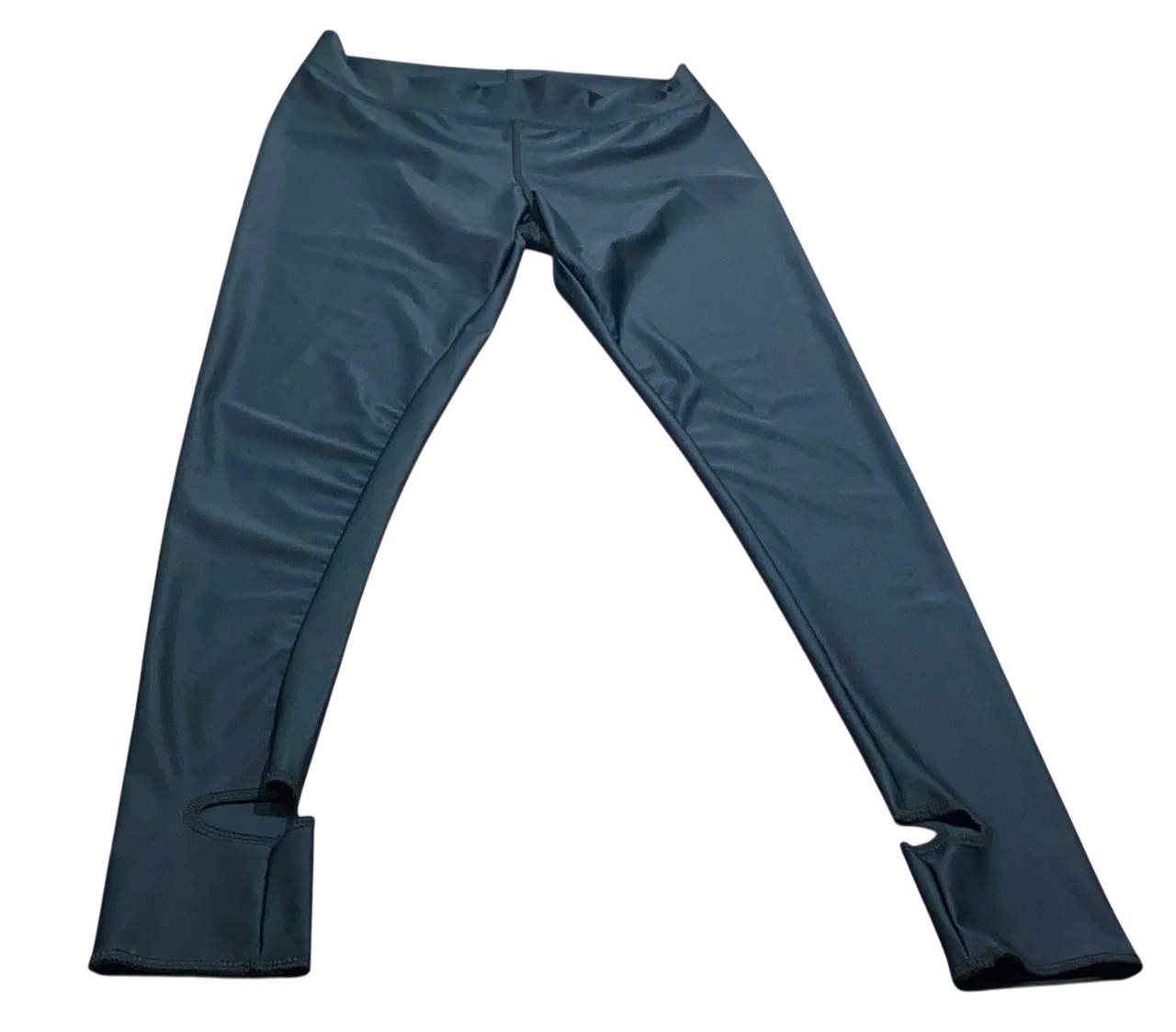 Plain black Kool Pressions compression legging proof-of-concept prototype laid flat on a workbench