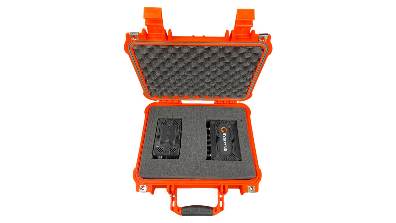 Two black IoT sensor units in foam cutouts inside an orange protective carrying case