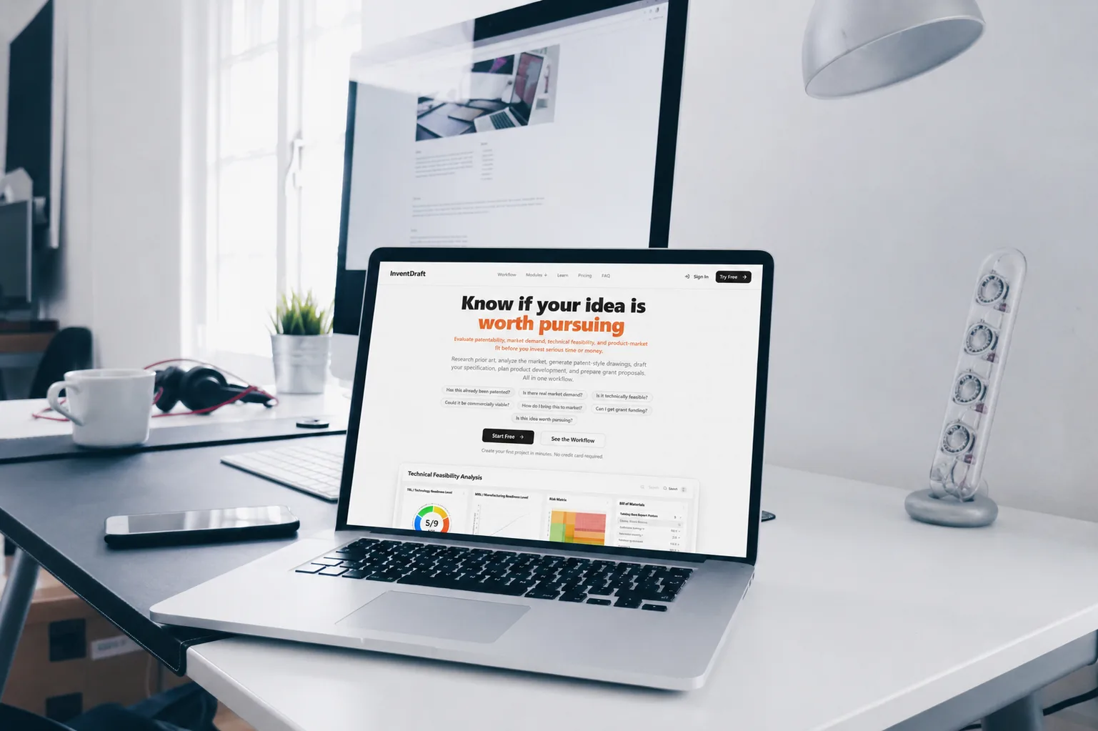 Clean analysis dashboard open on a laptop on a minimalist desk representing the InventDraft early stage exploration platform