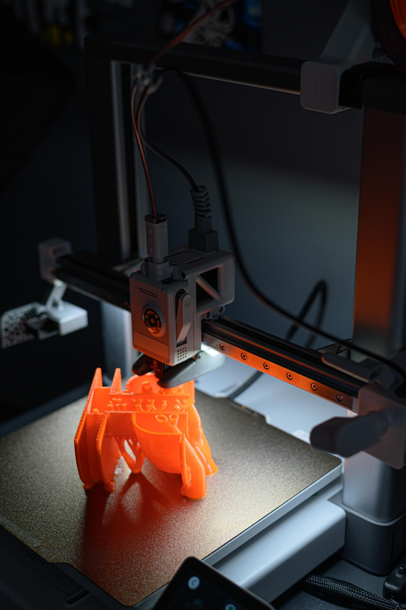 3D printer printing plastic prototype